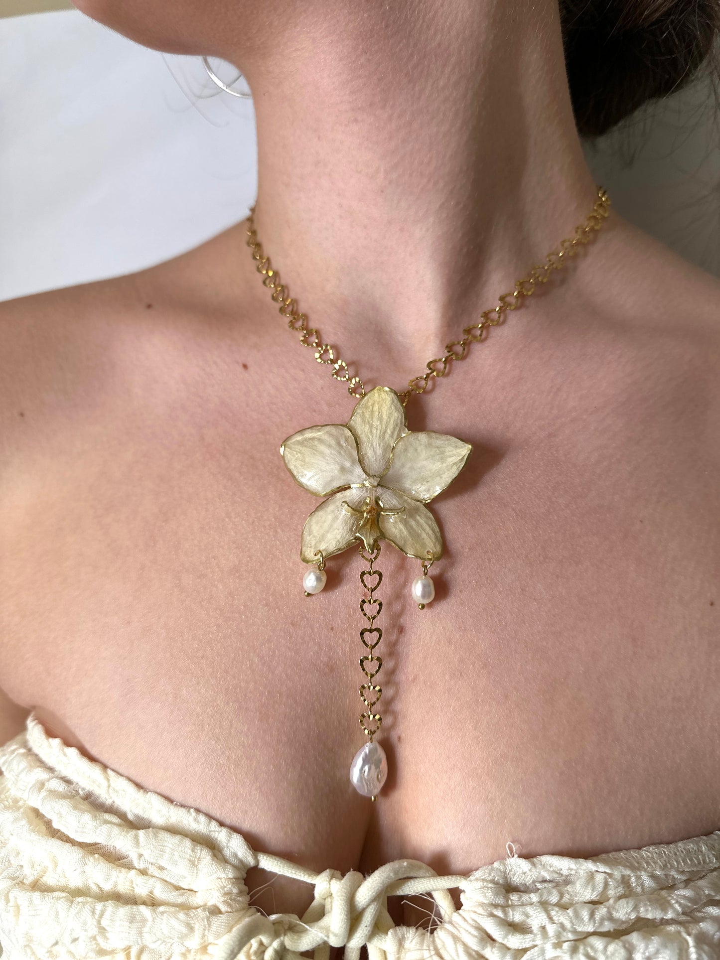 Lovely hearts orchid necklace