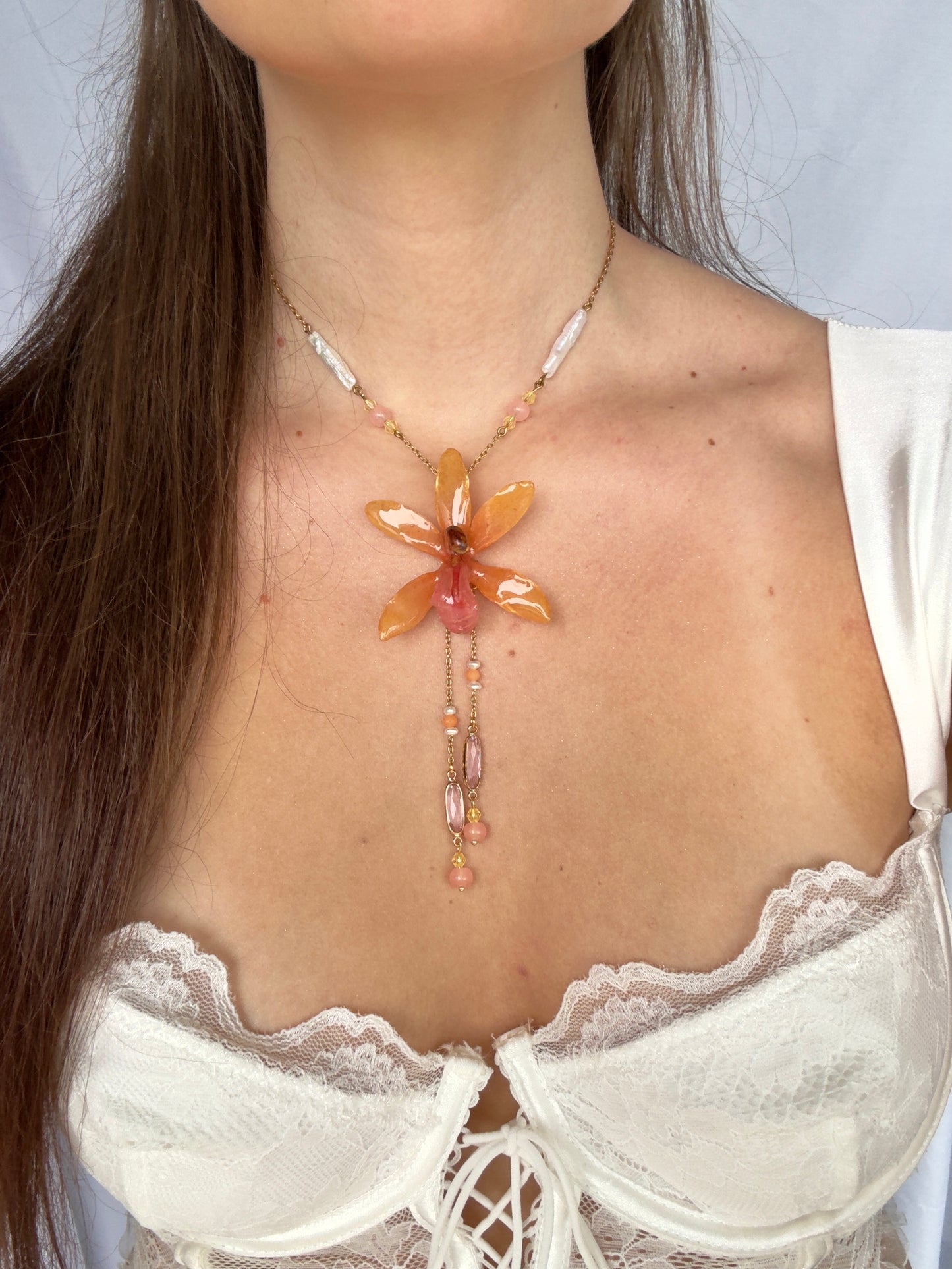 Blooming coral orchid necklace