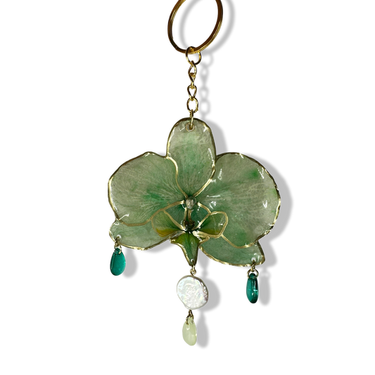 Green dairy orchid bag charm