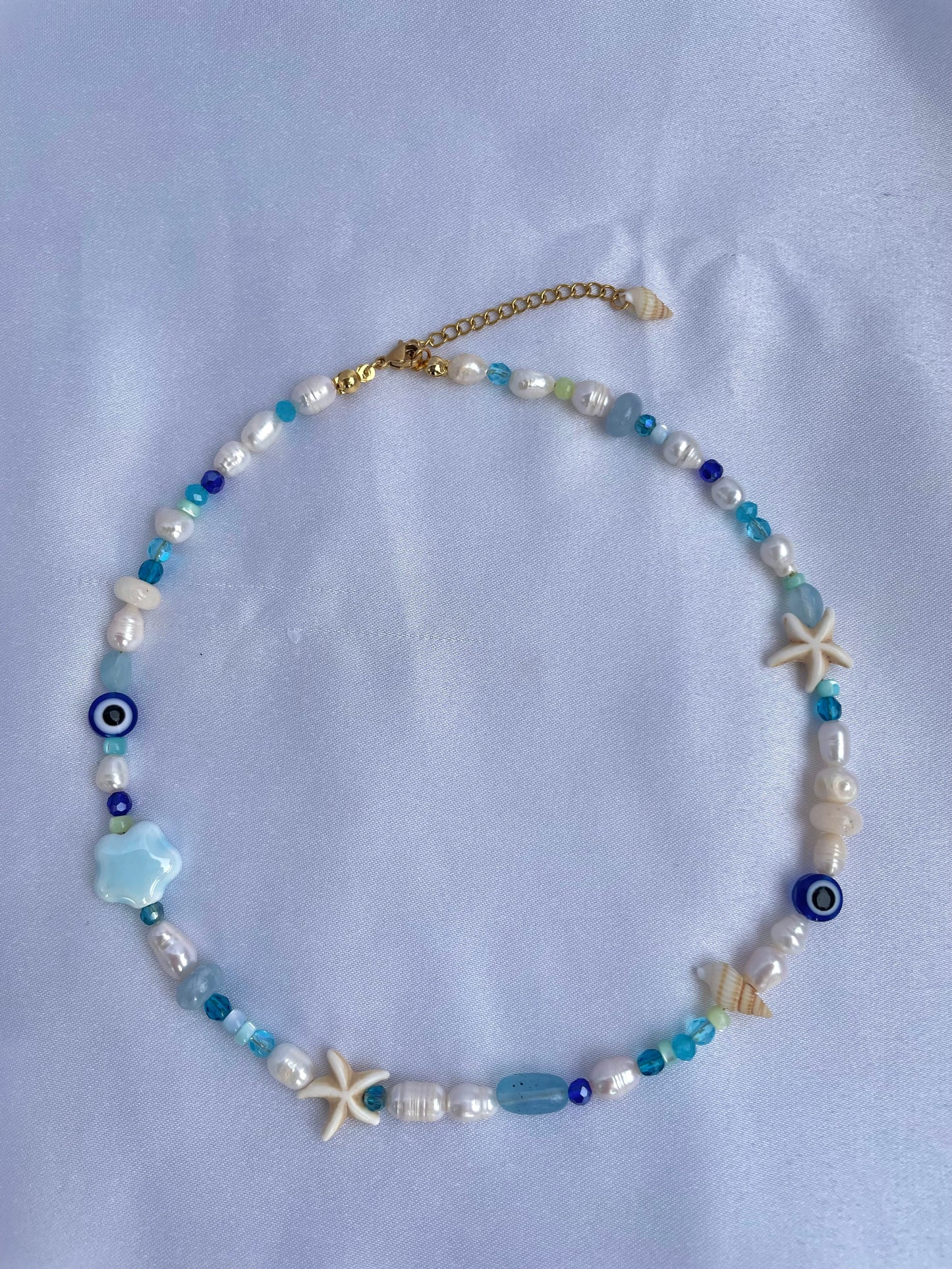 Blue eye and shell necklace