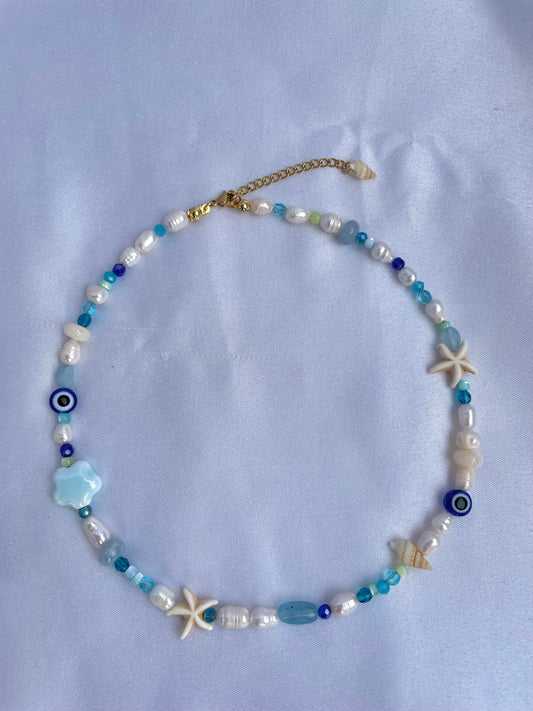 Blue eye and shell necklace